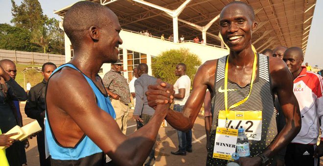 Kiprotich-congratulates-Cheptegei-after-the-Uganda-Cross-Country-championships.-Cheptegei-looks-set-to-carry-the-flag-in-London (1)
